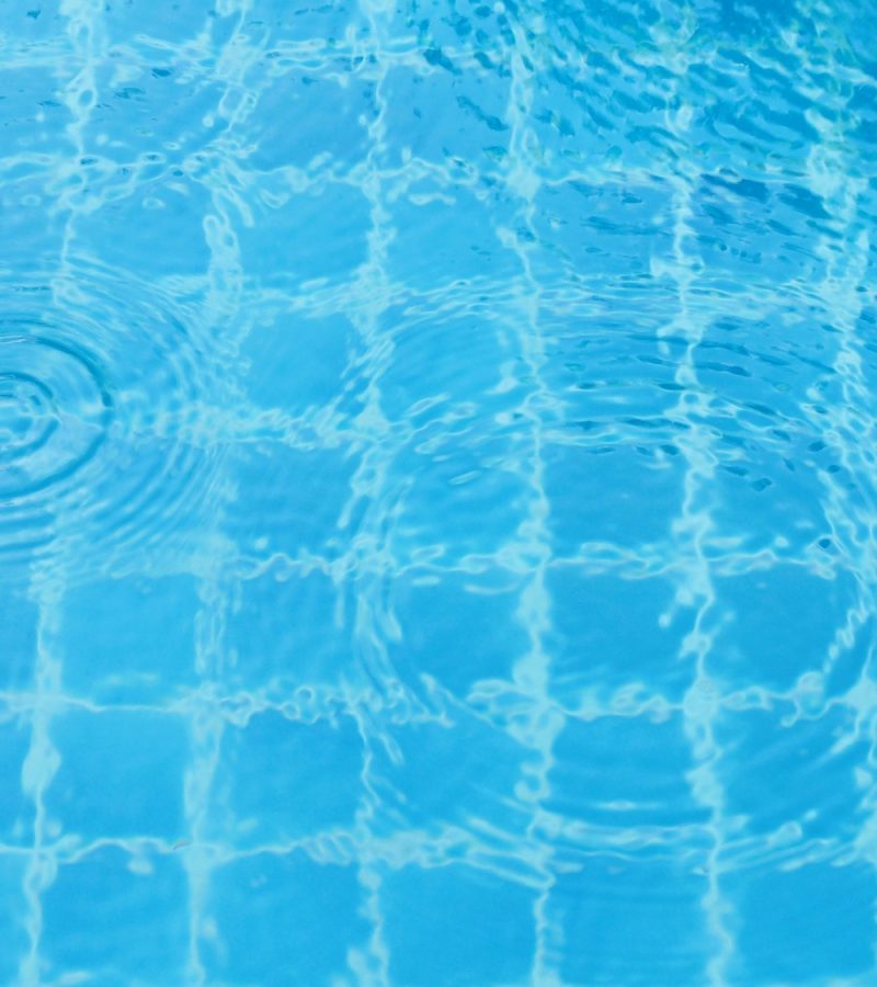 Rain drops on the swimming pool.